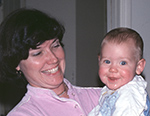 Mary and 9-month Dave strike stunning smiles in this 1981 slide